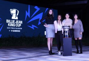 Team Canada at the Billie Jean King Cup Gala in front of trophy